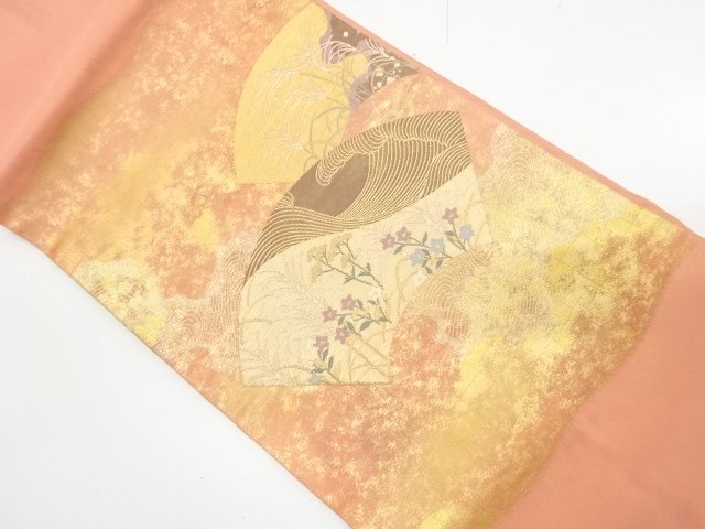 引箔　地紙に荒波・草花模様織り出し　名古屋帯